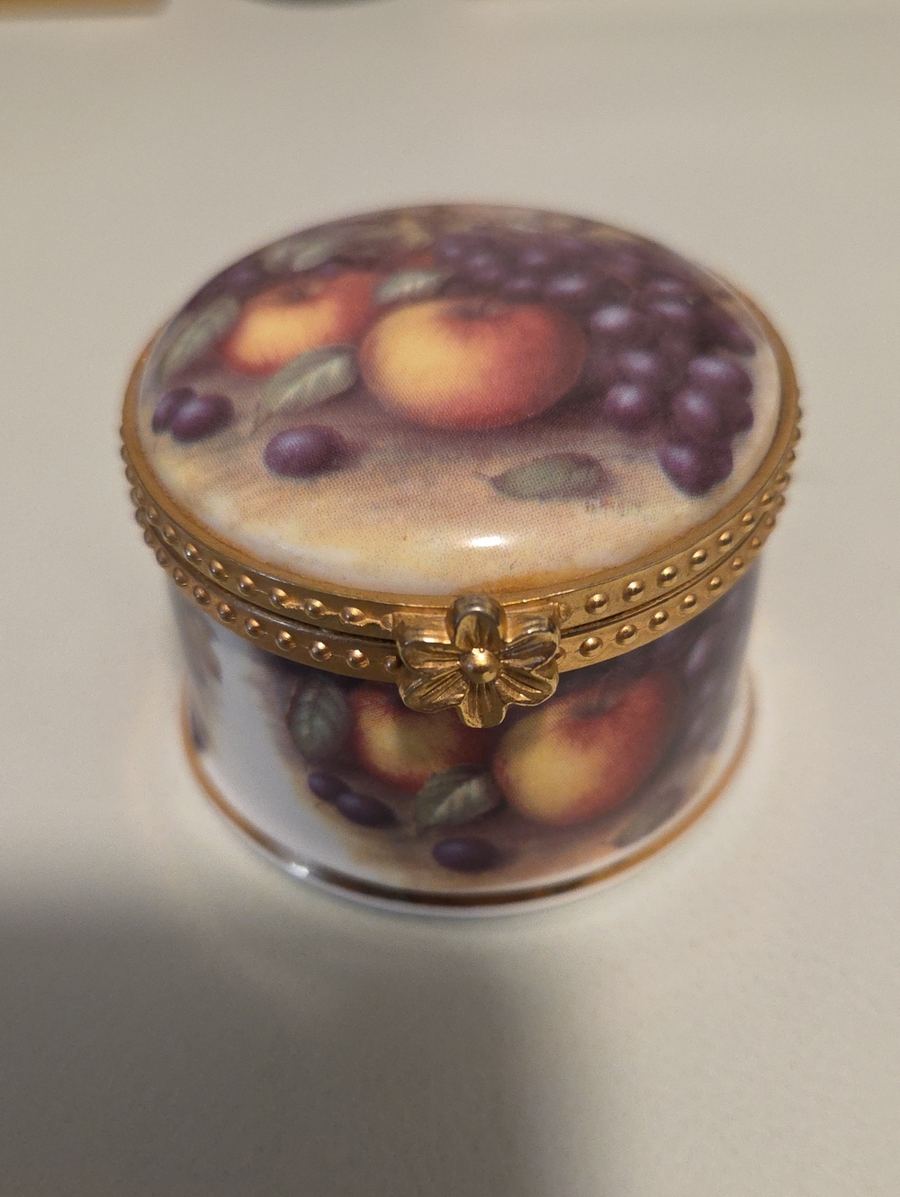Fruit Porcelain Trinket Box with Gold Accent Filled With Earrings